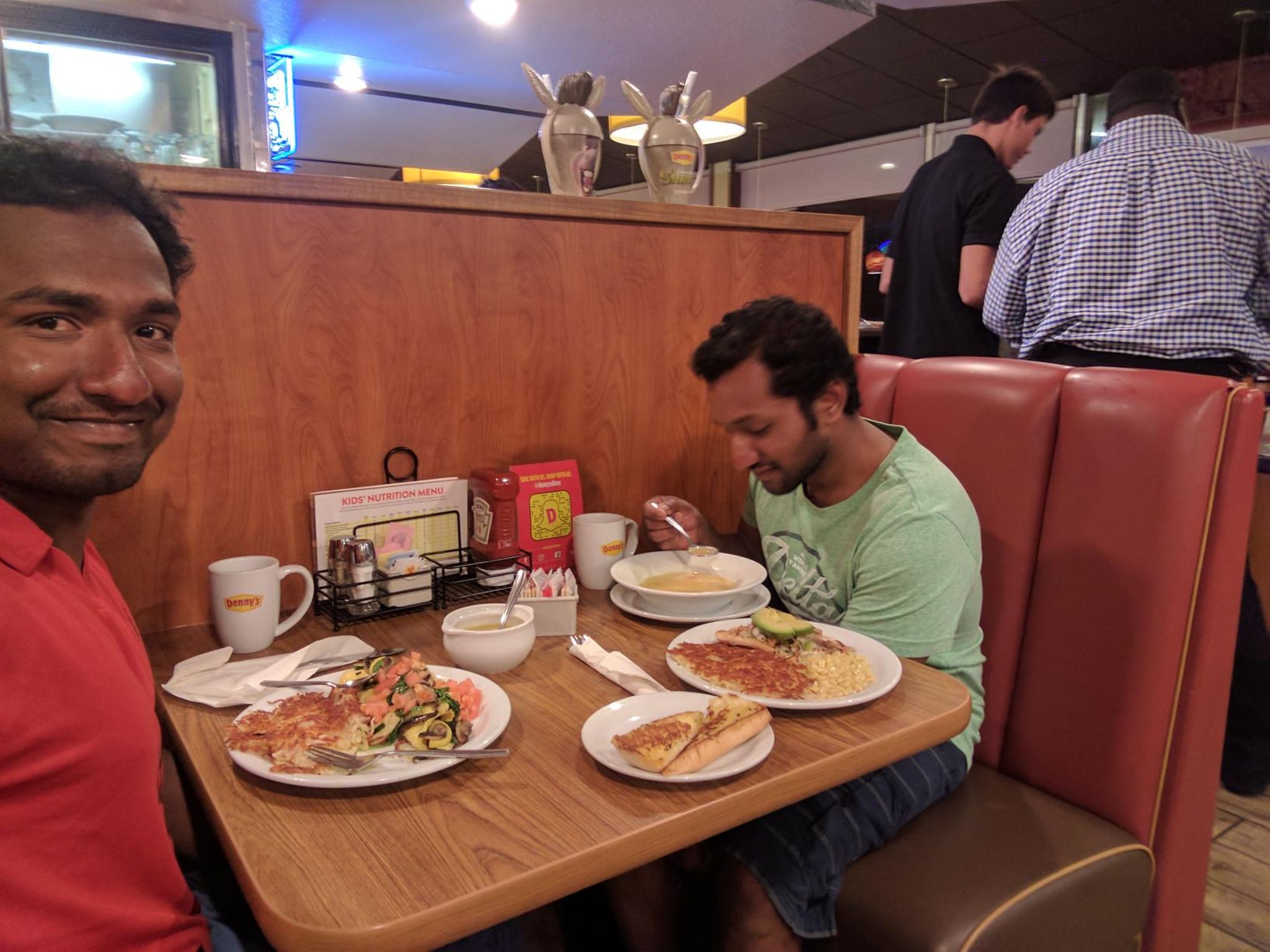 Jayaprakash having breakfast while bicycling to Los Angeles.